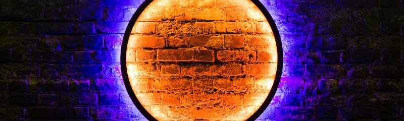 Light art on brick wall - London, UK